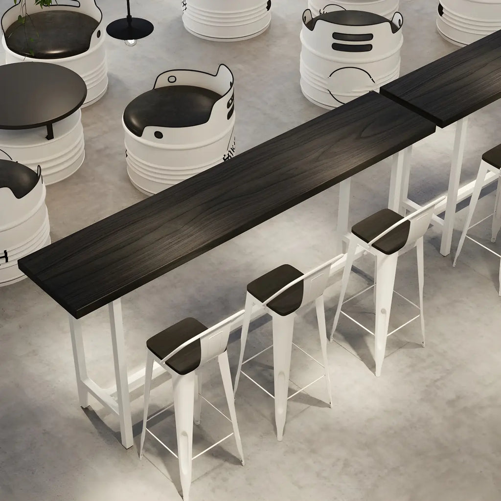 Table de bar industrielle avec plateau en bois noir et piètement en métal
