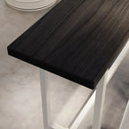 Table de bar industrielle avec plateau en bois noir et piètement en métal