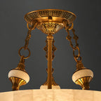 Luxueux lustre cylindrique en albâtre doré