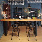 Table de bar rectangulaire en pin brun de style industriel avec piètement traîneau en métal