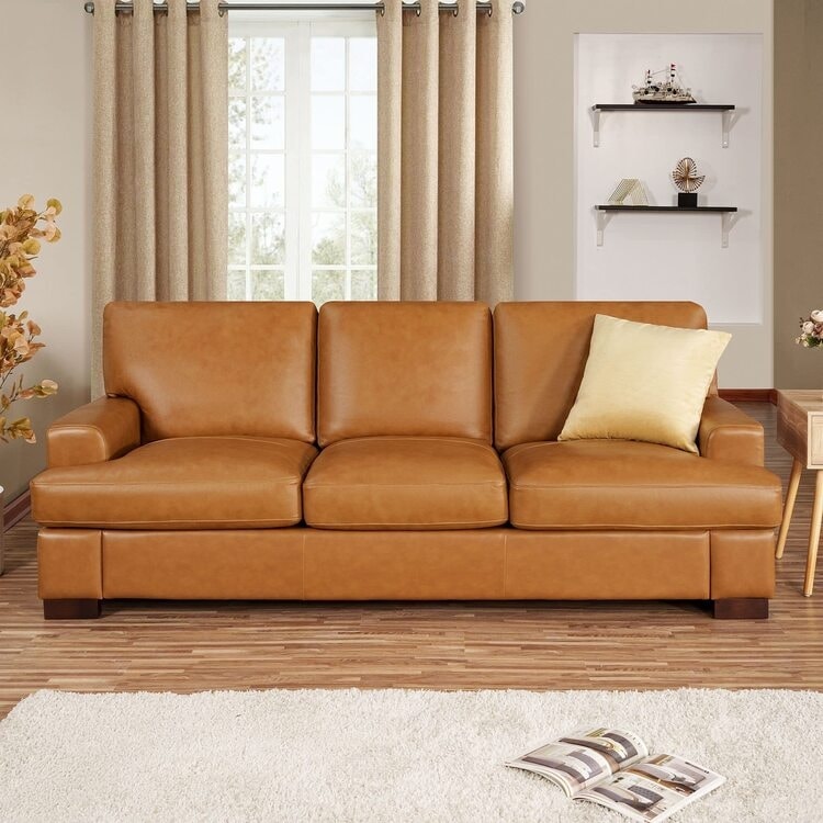 Canapé moderne en cuir véritable avec pieds en bois et coussin cylindrique supplémentaire