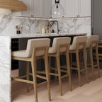 Tabouret de bar moderne Gracie, chaise rembourrée en tissu bouclé et pieds en bois brossé