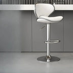 Tabouret de bar pivotant et réglable avec selle rembourrée en cuir