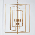 Lustre moderne rectangulaire en métal doré à structure cage