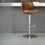 Tabouret de bar pivotant et réglable avec selle rembourrée en cuir